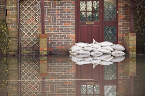 flood street, sandbags in front of a door